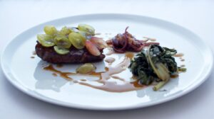 Vitello, cacao e uva